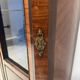 Napoleon III display cabinet in rosewood veneer and marquetry, 19th century.