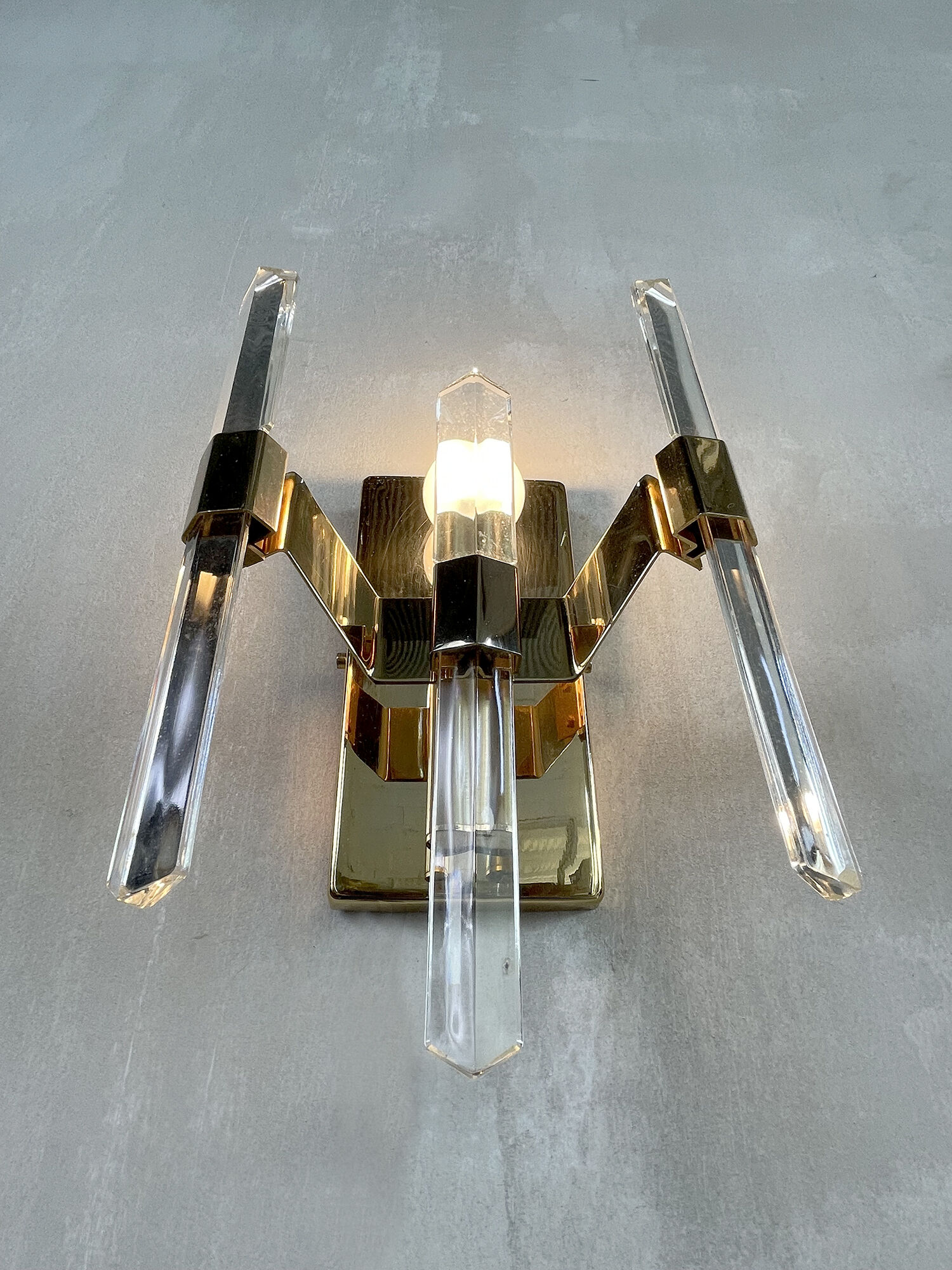 Pair of wall lamps in glass and gilded metal Sciolari