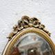 Old oval mirror Louis XVI style in gilded wood 50cm x 34cm
