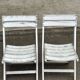 2 folding garden chairs in wood in the classic bistro style.