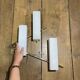 Pair of asymmetrical Hollywood Regency sconces, bronze - opaline glass, 70s