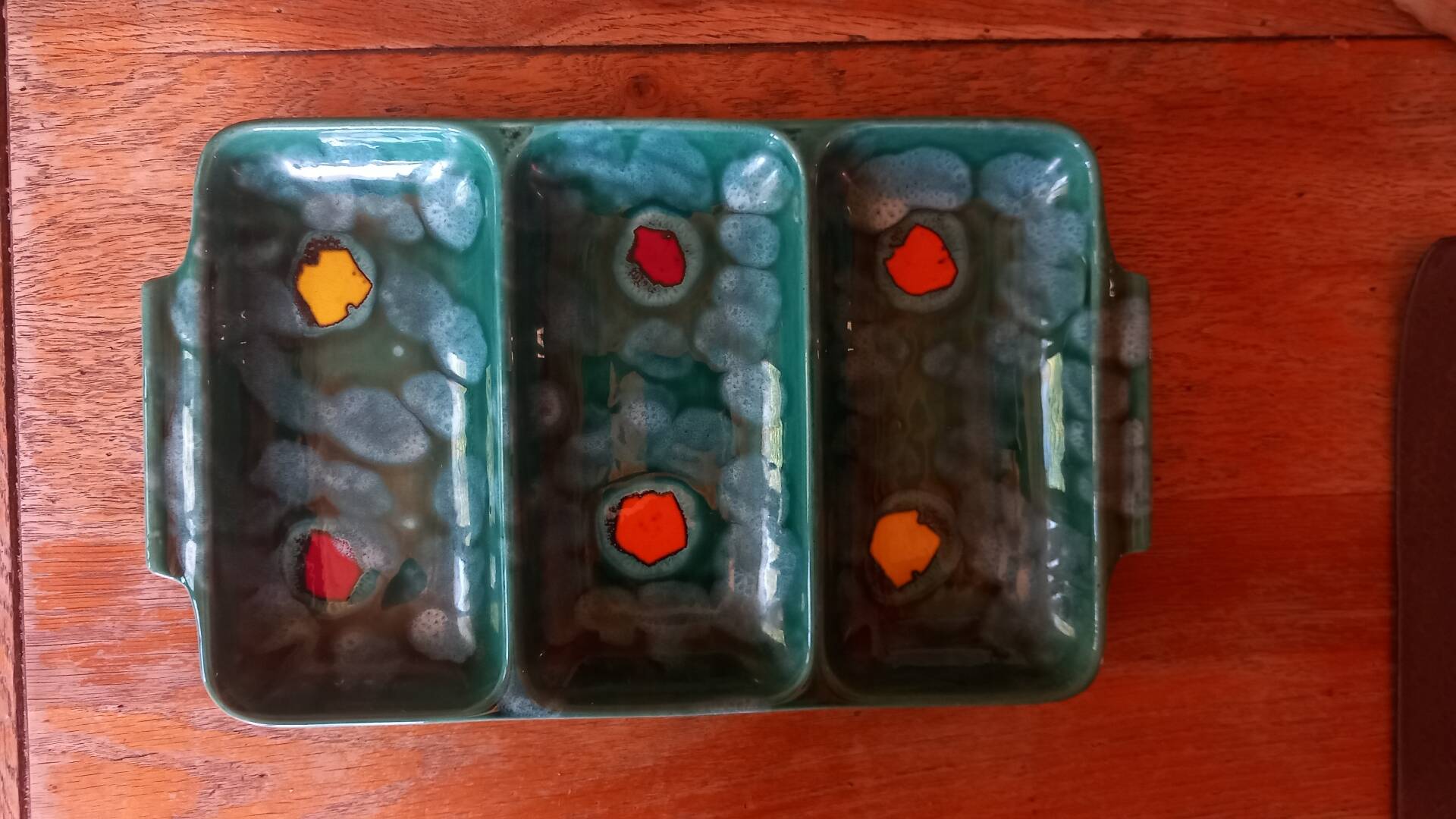 Glazed ceramic dish with compartments attributed to Poët-Laval.