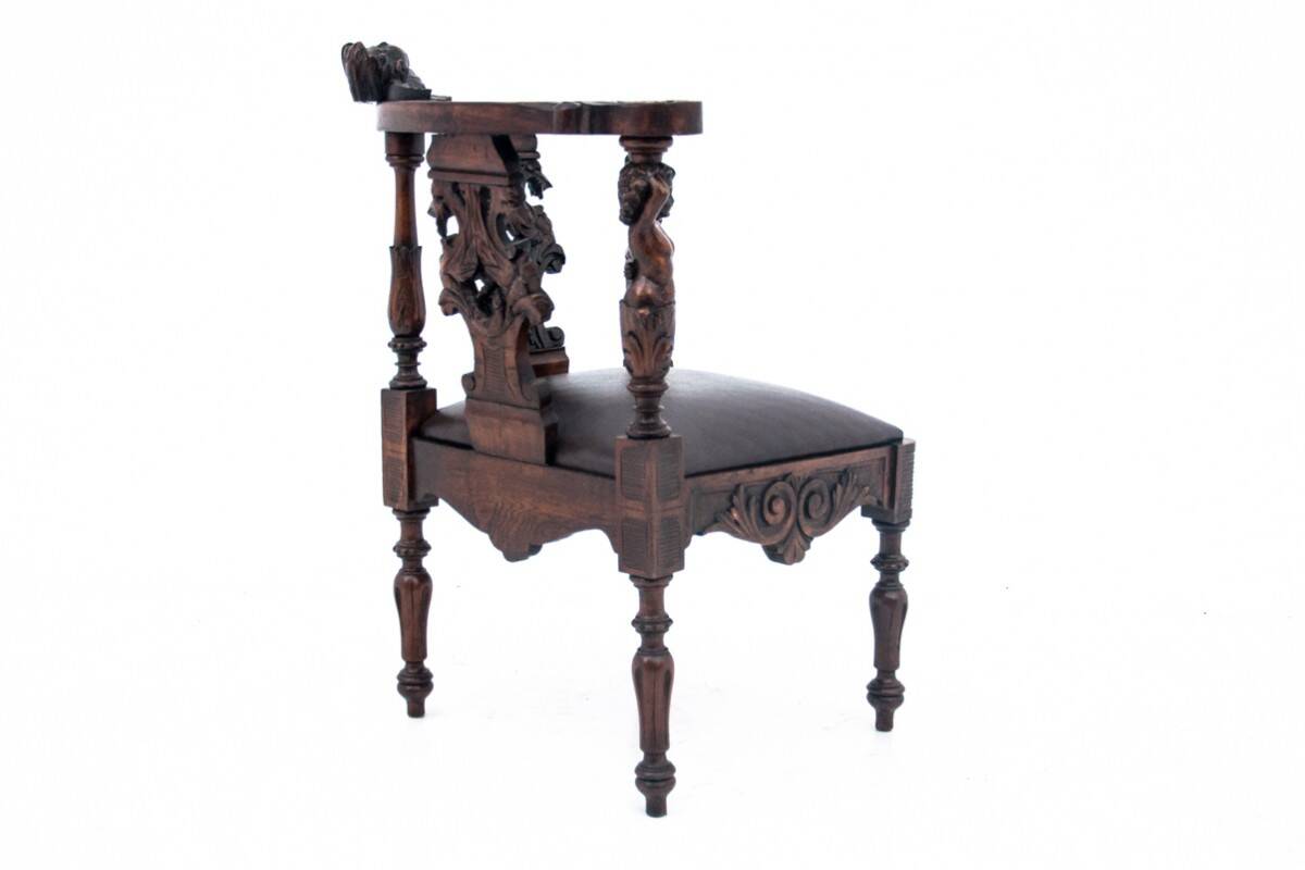 Antique corner armchair, Western Europe, circa 1900.