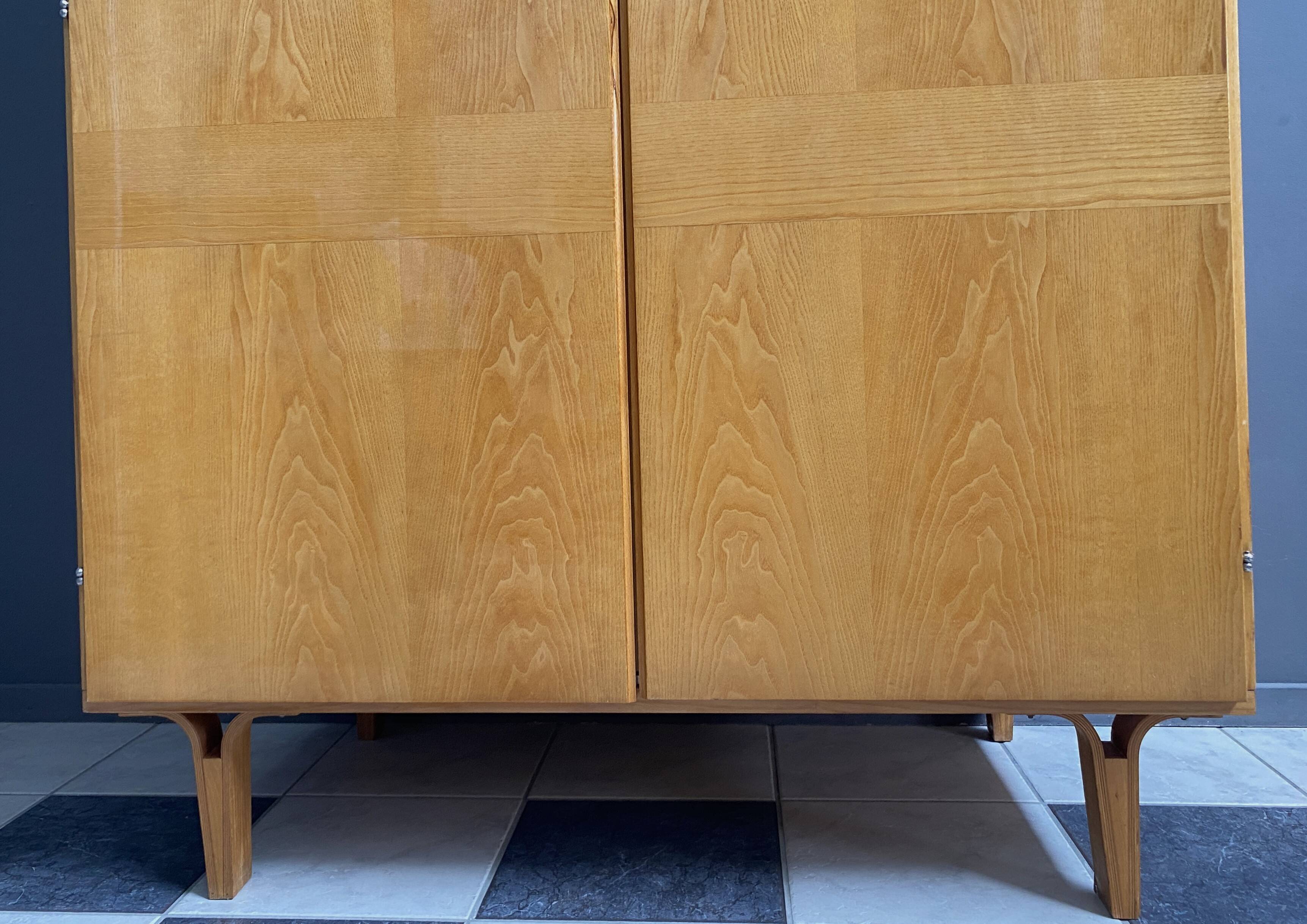 All shelf wardrobe cabinet in ash wood by františek mezulánik  for novy domov