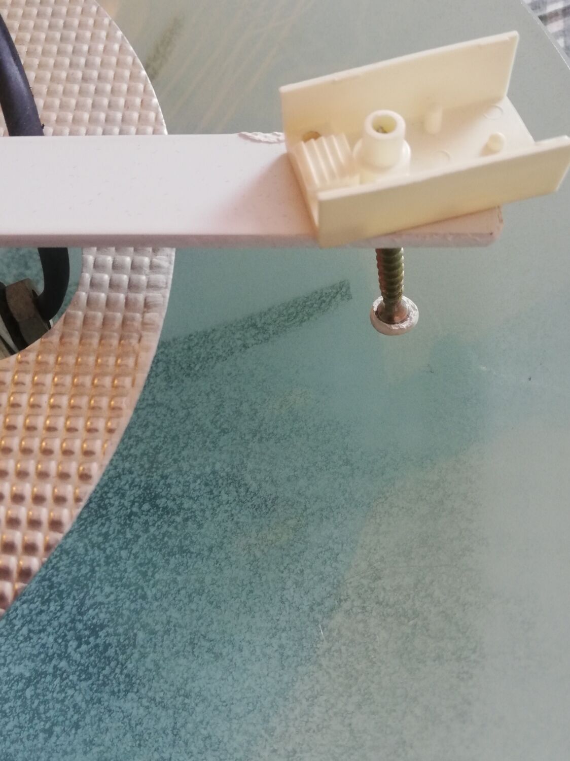 White opaque glass ceiling light and golden metal sun