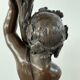 Candelabra with cherub in patinated bronze