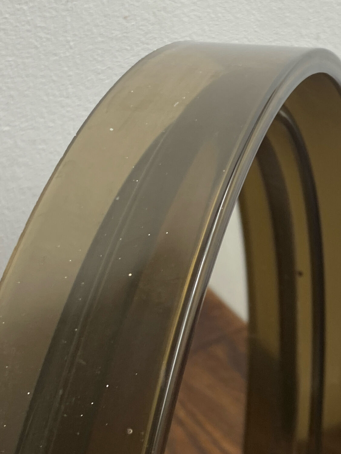 Circular mirror, smoked plastic, 1960s/70s.