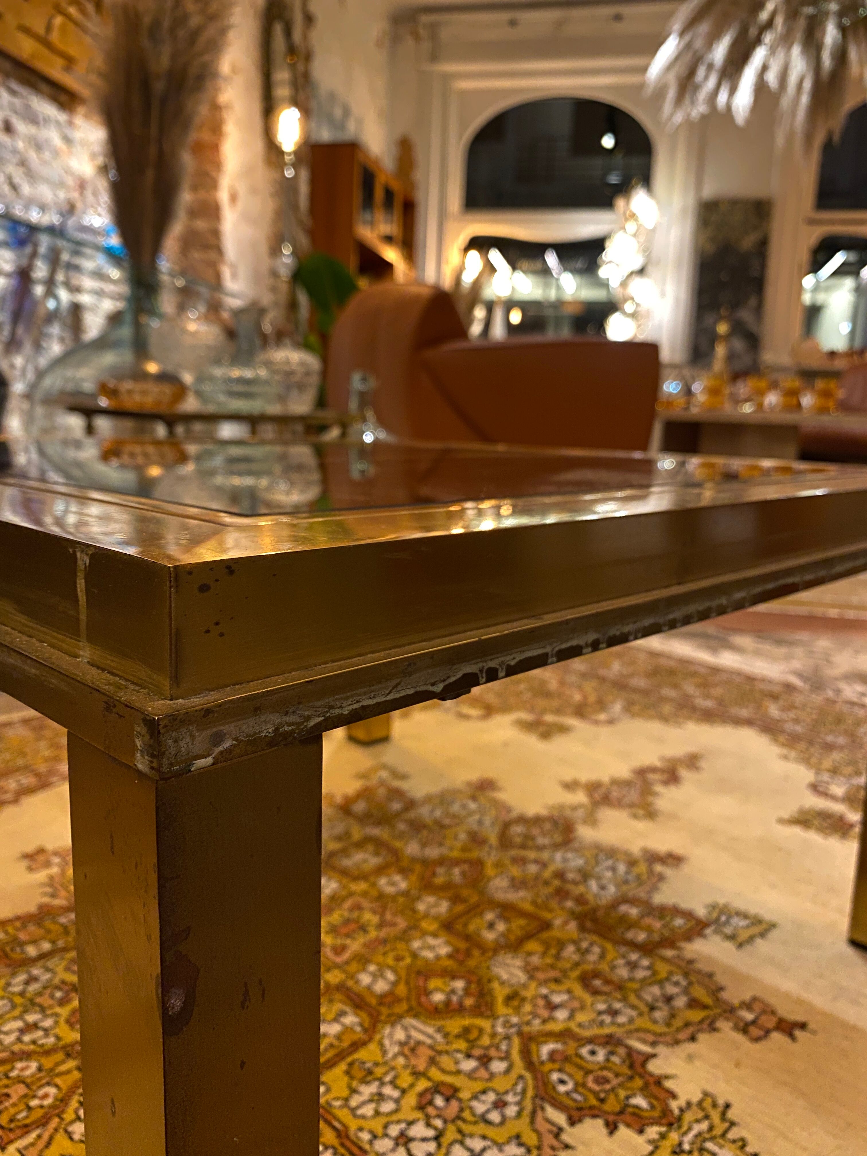 Gold square coffee table and smoked glass