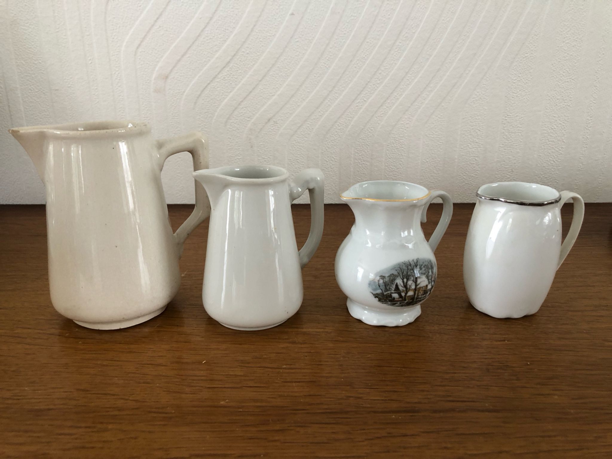 Set of 4 Vintage Porcelain Milk Jugs