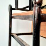 Brutalist hairdresser in wood and wrought iron