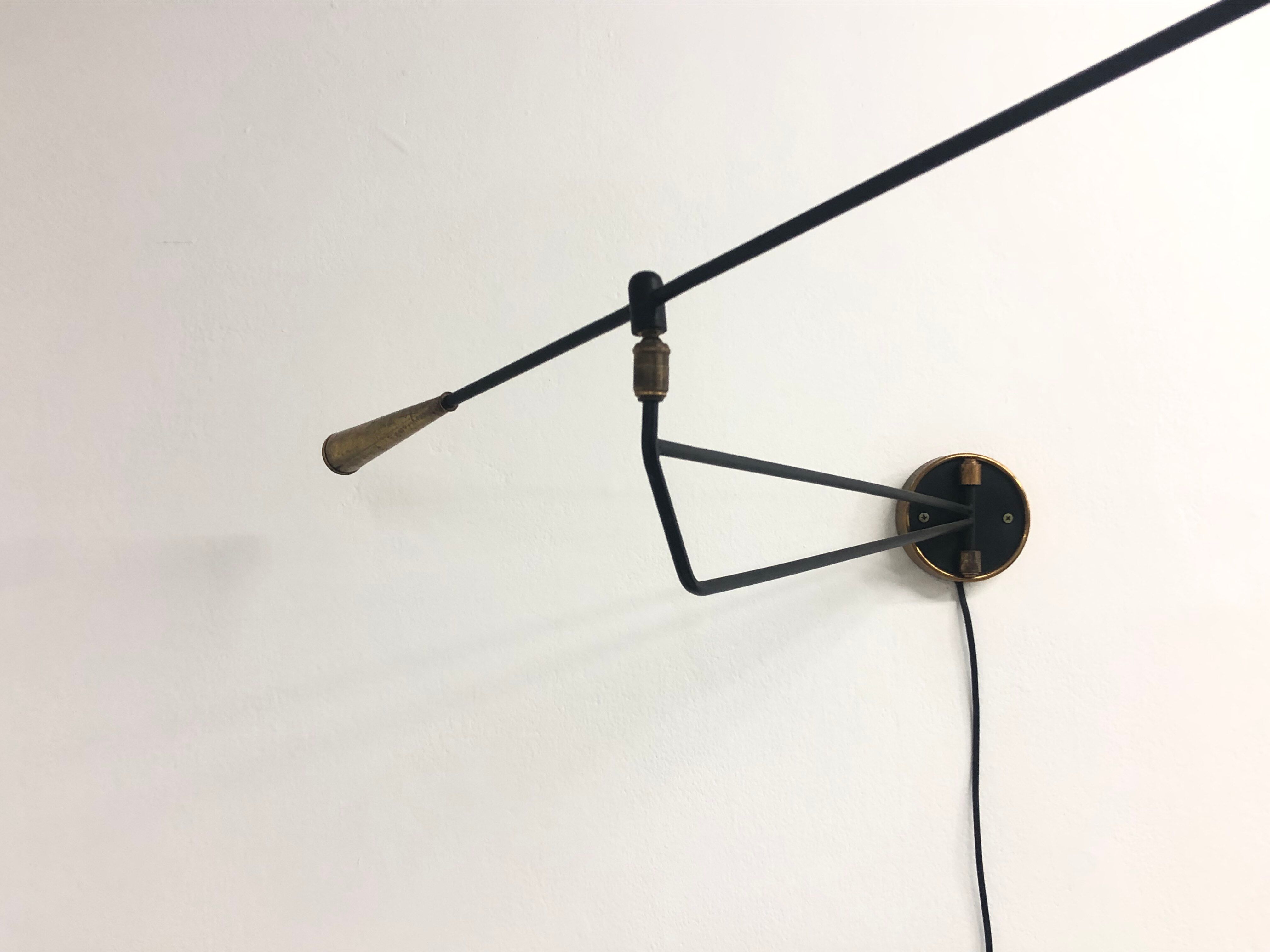 Metal and brass articulated sconce edited by Lunel, 1950s
