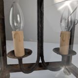 Wrought iron lantern with glass panels, leaf motifs