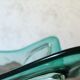 Large amber and green glass cup