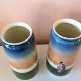 Pair of enamelled sandstone vases