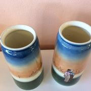 Pair of enamelled sandstone vases