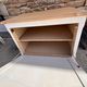 Renovated vintage furniture in raw wood and white.