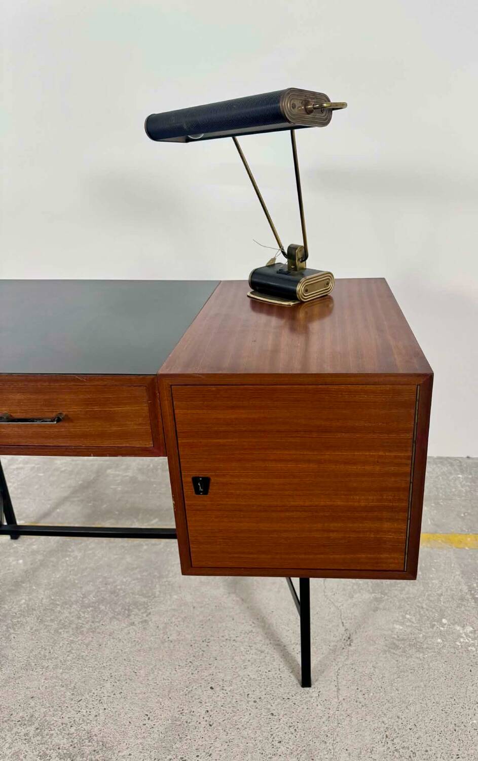 French modernist desk from the 1950s with 2 drawers, 1 cabinet, and 1 container.