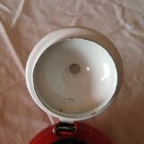 Small red metal teapot