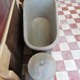 old bathtub with its stove
