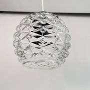 Petit globe pomme de pin transparent