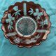 Red and transparent glass bowl with floral motifs and vintage wheat cobs