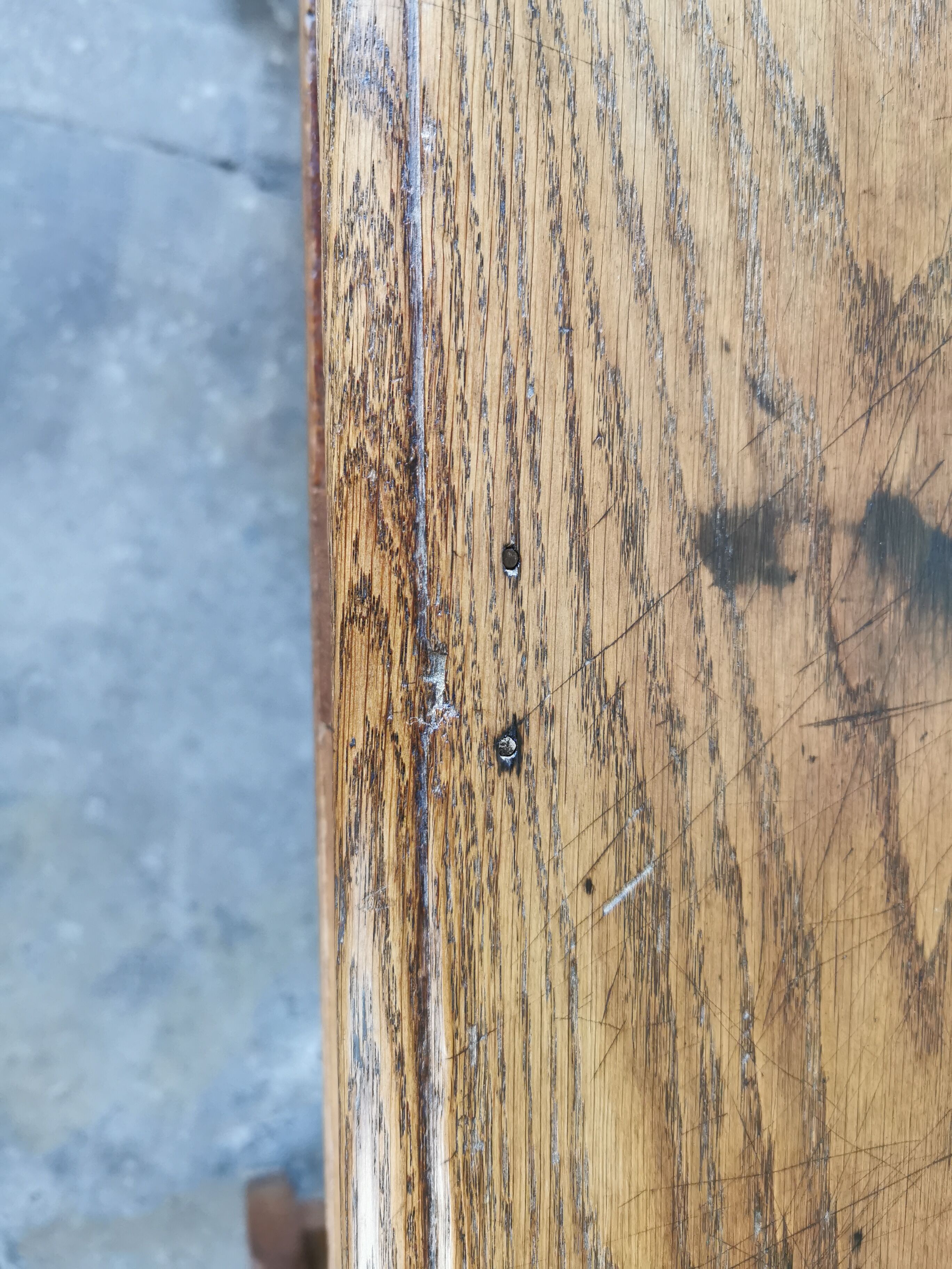Table in raw oak, countryside.