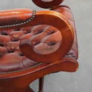 Red cowhide leather English Chesterfield armchair combined with wood