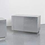 Pair of low buffets in brushed metal, French work, 1970s.