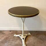 Bistro table in gray cast iron and brown melamine
