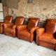 Lot de 4 fauteuils club, Cognac