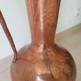 Old italian amphora vase in hammered copper