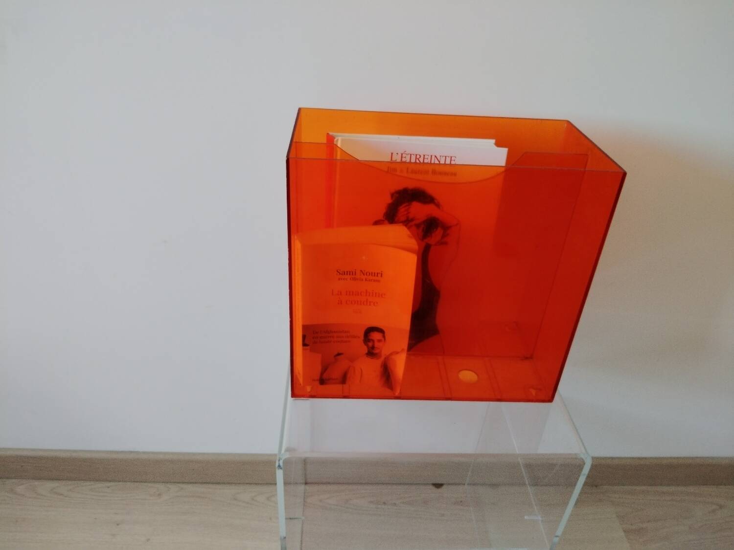Vinyl magazine holder in orange plexiglass