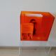 Vinyl magazine holder in orange plexiglass