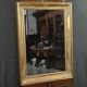 Important miroir en bois doré, style Restauration – Milieu XIXe
