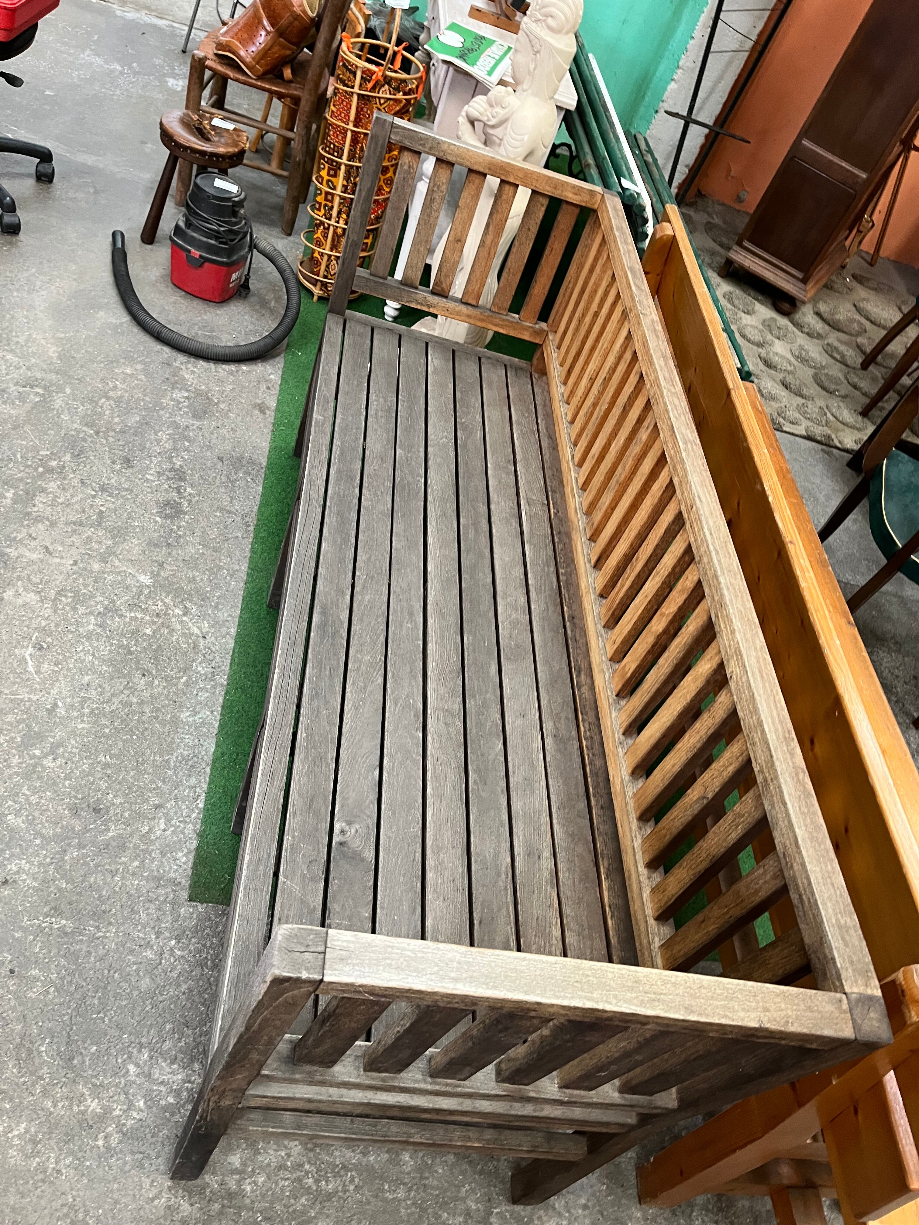 Colonial-style teak bench