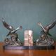 Pair of art deco seagull bookends in regulates and marble, bookcase, desk