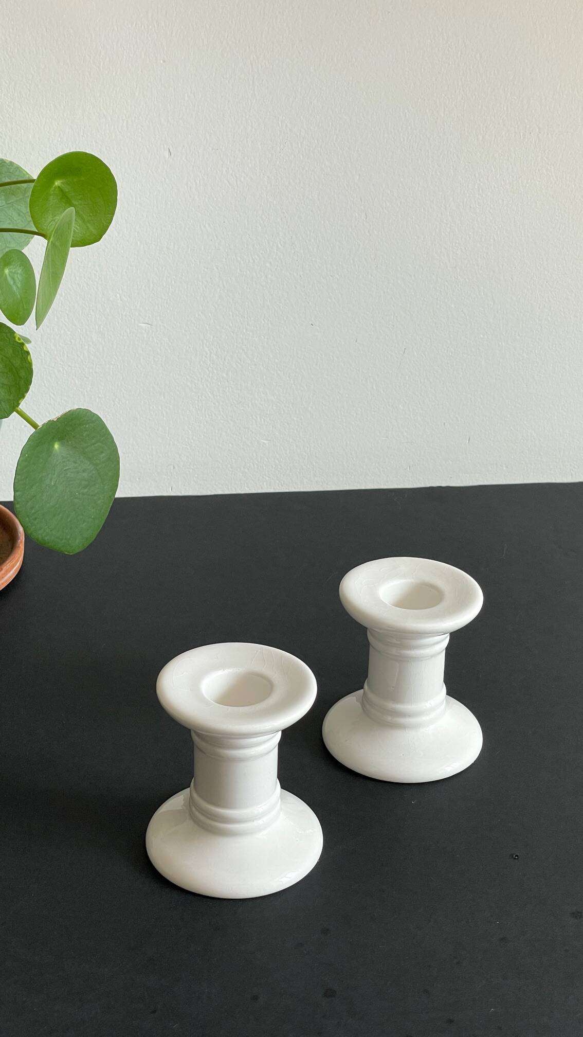 Pair of White Ceramic Candlesticks