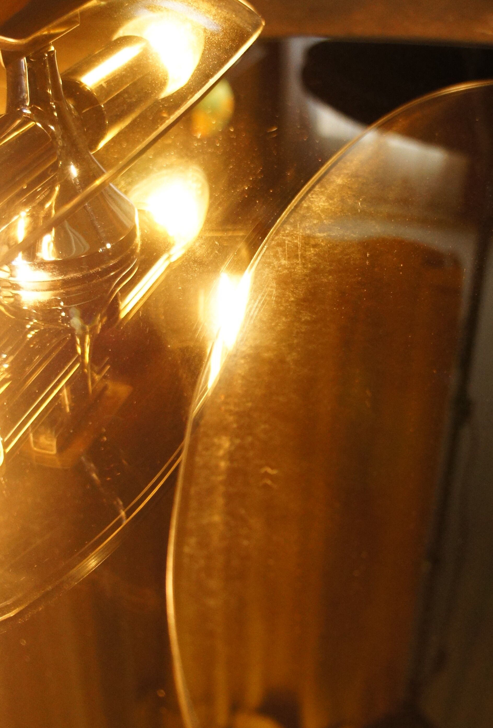 Light mirror in bronze tinted curved smoked glass
