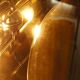 Light mirror in bronze tinted curved smoked glass