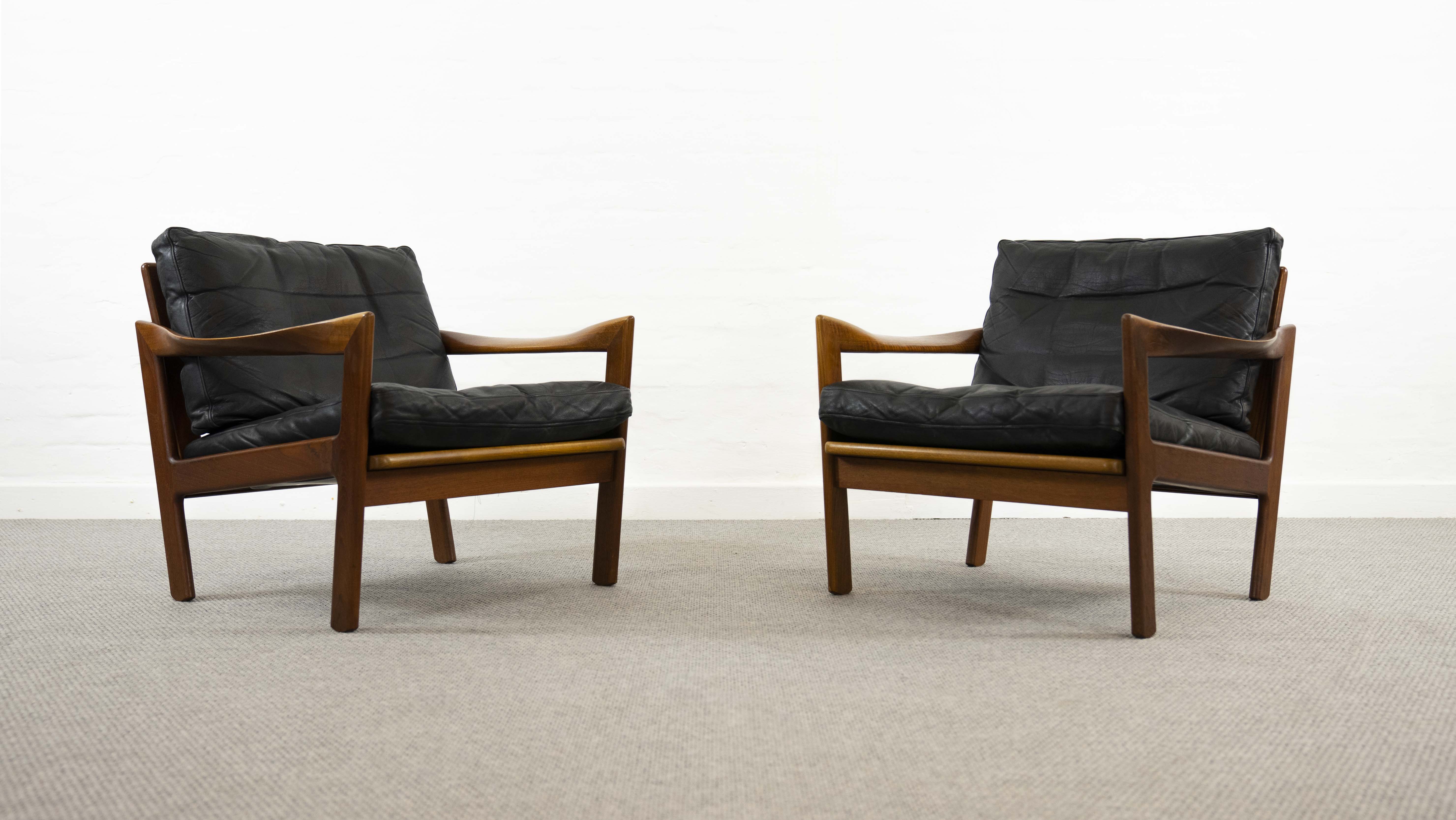 Pair of teak chairs in black leather by Illum Wikkelsoe for Niels Eilersen, Denmark