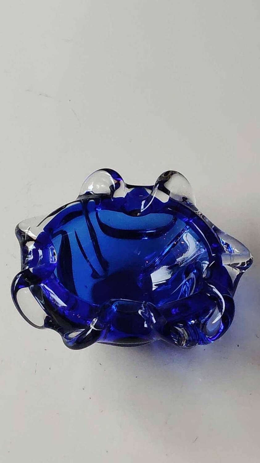 Empty pocket blown art glass from Murano Italy, corolla shape, cobalt blue