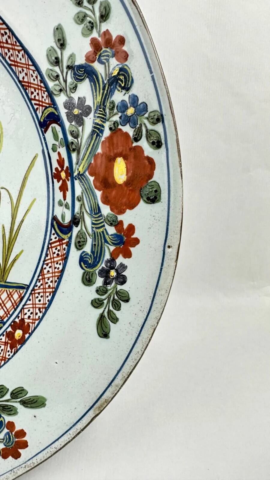 Delftware plate with gilded highlights, relief decoration, 18th century, 35 cm
