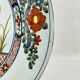 Delftware plate with gilded highlights, relief decoration, 18th century, 35 cm