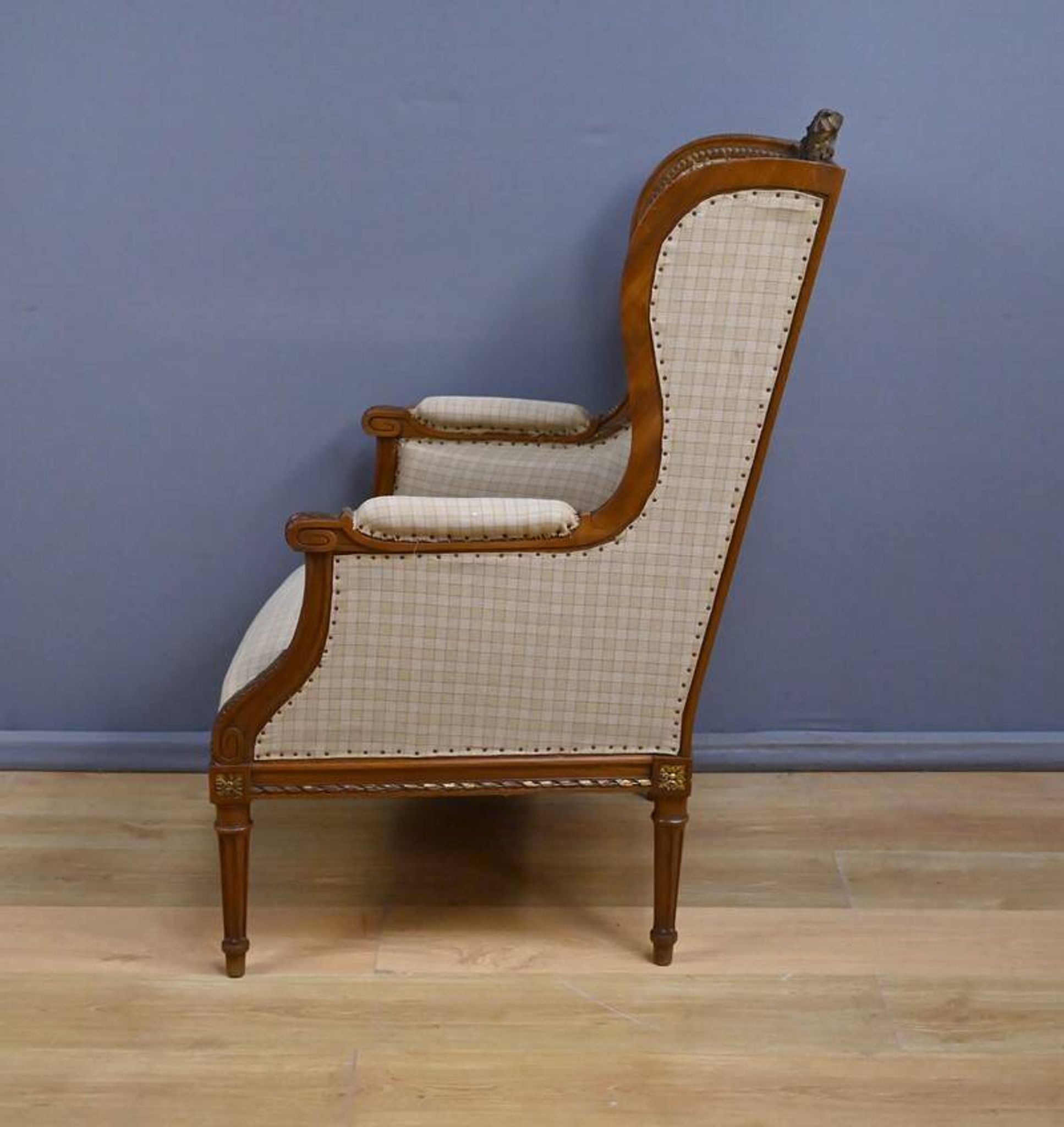 Wingback armchair in walnut, Louis XVI style – late 19th century
