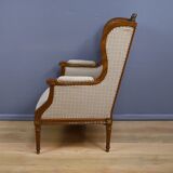 Wingback armchair in walnut, Louis XVI style – late 19th century