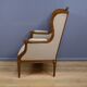 Wingback armchair in walnut, Louis XVI style – late 19th century