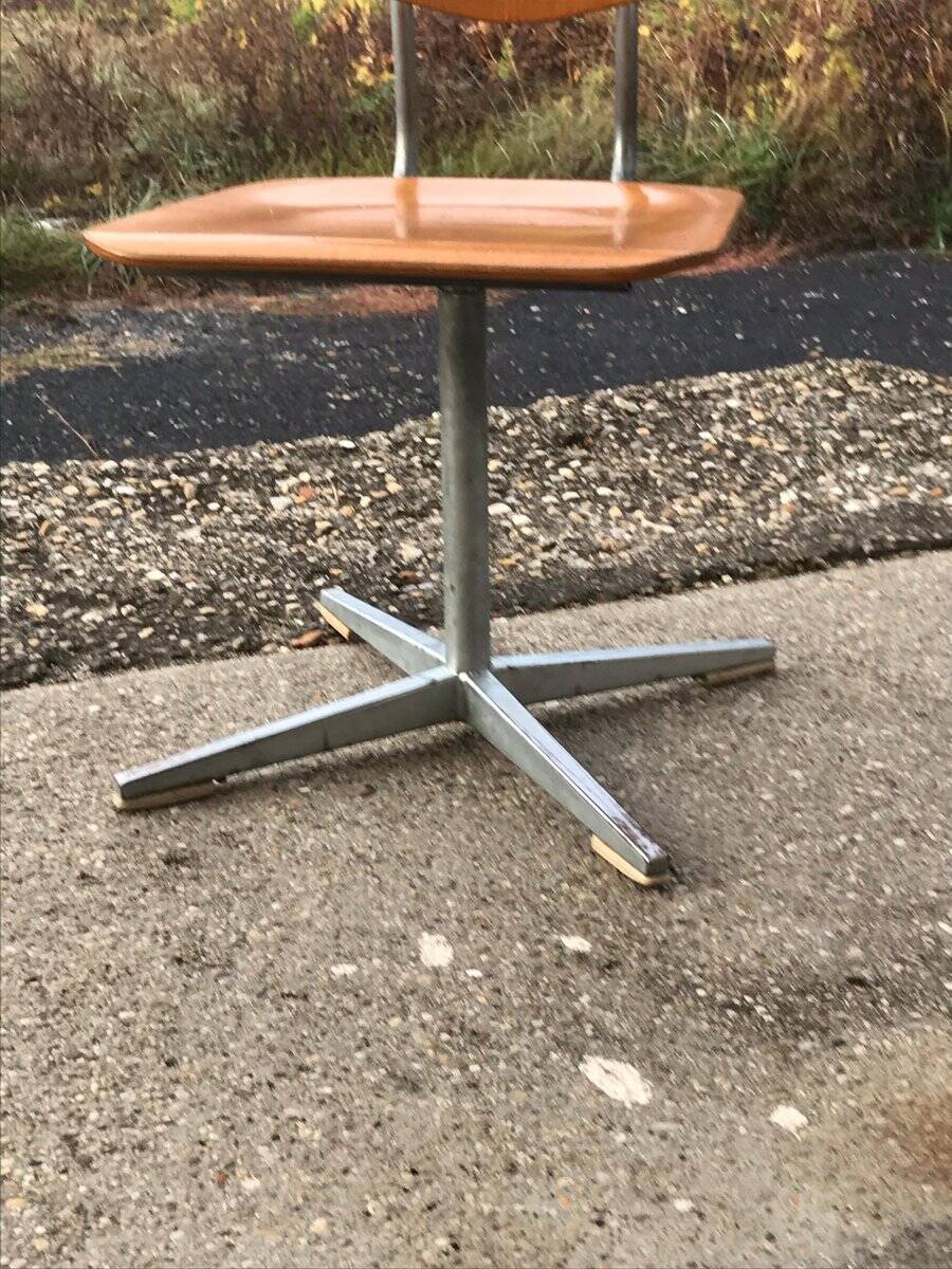Set of 3 Embru school chairs, Switzerland, 1960s — brown plywood and steel frame.
