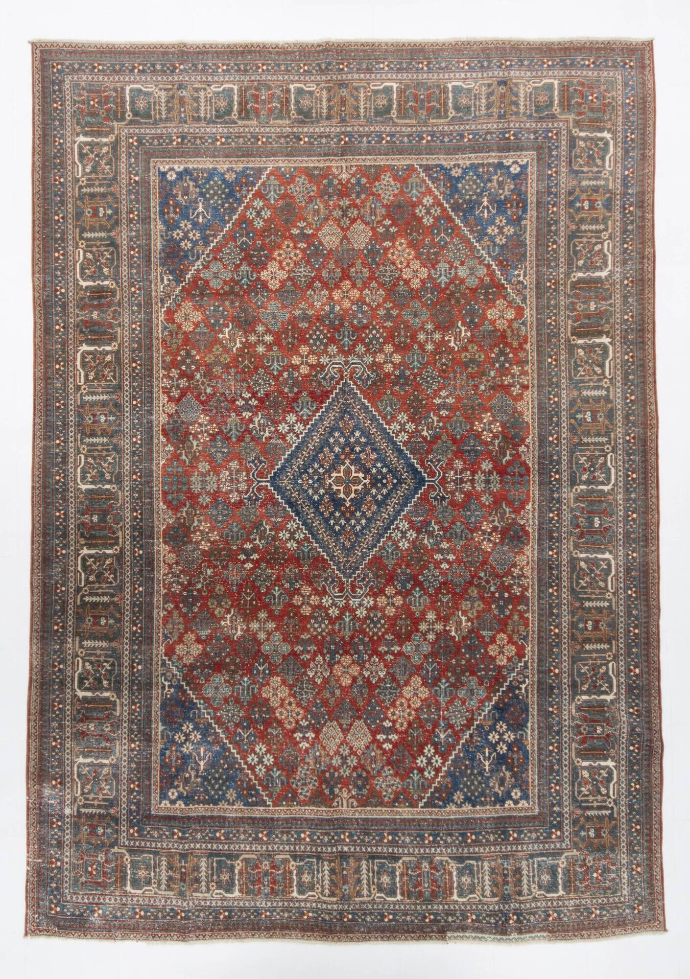 Vintage Turkish rug in brick red and indigo with floral design, 276 × 389 cm