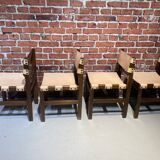 Set of four wooden and leather chairs from Maison Regain