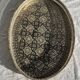 Oval Moroccan plateau engraved on a base 50x35.